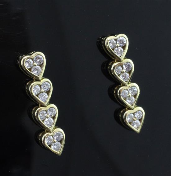 A pair of unmarked gold and diamond drop earrings, 1in.